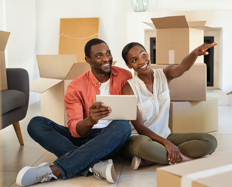 couple holding ipad with unboxing