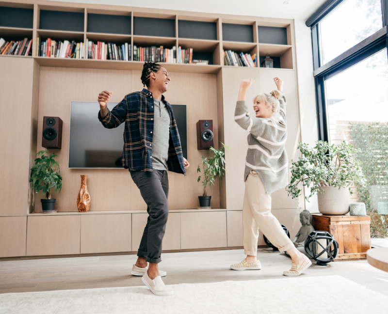 couple dancing in living room