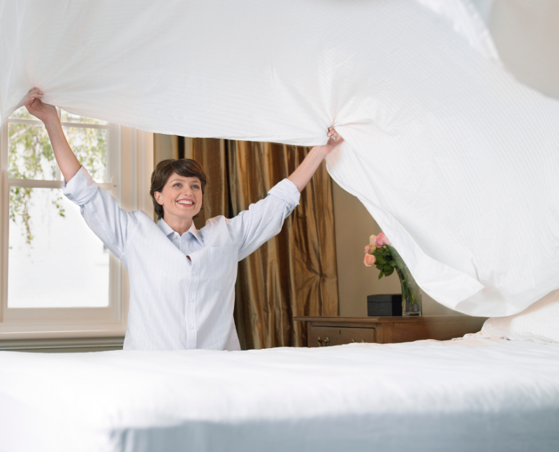 cleaning and changing bedding sheets