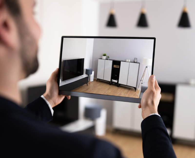 man holding ipad for virtual guided home tour