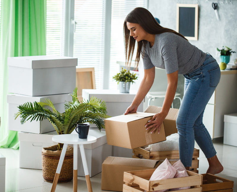 woman organizing and sorting her things in her home