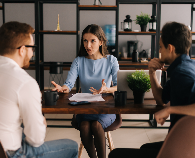 real estate agent discussing in front of her client