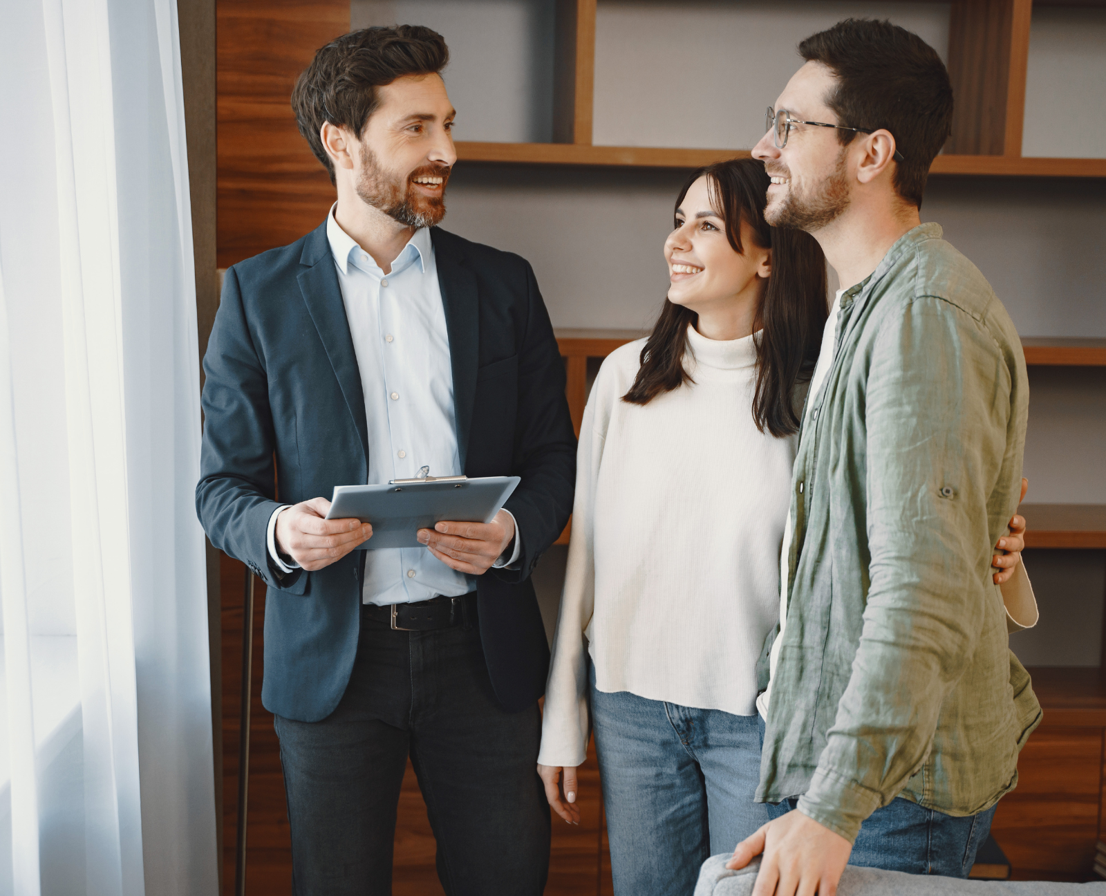 couple talking to a real estate agent